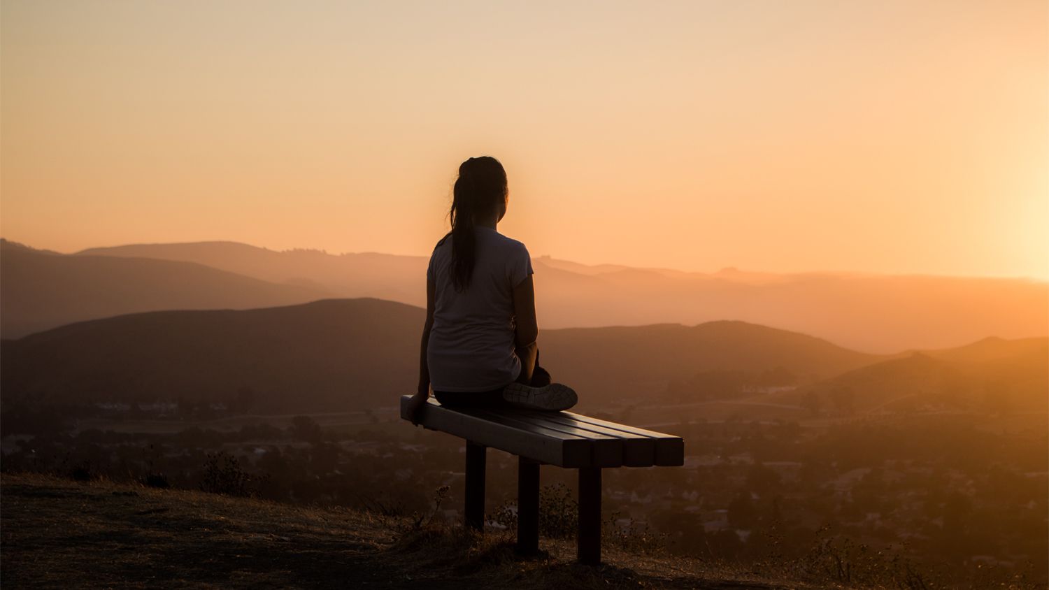 Woman admiring sunset